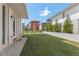 Well-maintained backyard with lush green lawn, modern design, and privacy fence at 380 2Nd St, Fayetteville, GA 30214
