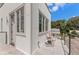 Exterior balcony with metal railings, contemporary chairs, and views of the neighborhood at 380 2Nd St, Fayetteville, GA 30214