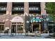 Charming commercial building featuring unique storefronts, outdoor seating, and exposed brick at 380 2Nd St, Fayetteville, GA 30214