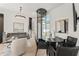Bright and spacious living area featuring a modern elevator, stylish decor, and comfortable seating at 380 2Nd St, Fayetteville, GA 30214
