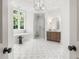 Bright bathroom featuring a freestanding tub, glass shower, and sleek vanity, creating a spa-like ambiance at 4560 Harris Trl, Atlanta, GA 30327