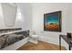 Chic powder room with a marble countertop, modern light fixture, and eye-catching artwork at 4560 Harris Trl, Atlanta, GA 30327