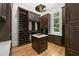 Walk-in closet with custom shelves, drawers, and ample storage space, perfect for organizing your wardrobe at 4560 Harris Trl, Atlanta, GA 30327