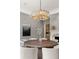 Elegant dining room with fireplace and stunning chandelier at 4560 Harris Trl, Atlanta, GA 30327