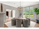 Inviting dining room featuring large windows and a chandelier at 4560 Harris Trl, Atlanta, GA 30327