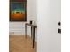 Elegant entryway featuring hardwood floors, a stylish console table, and a decorative art piece at 4560 Harris Trl, Atlanta, GA 30327