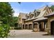 Spacious home featuring a motor court and three car garage at 4560 Harris Trl, Atlanta, GA 30327