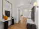 Elegant entryway with marble-topped console and art lighting at 4560 Harris Trl, Atlanta, GA 30327