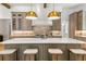 Spacious kitchen island with bar seating and pendant lighting, perfect for entertaining at 4560 Harris Trl, Atlanta, GA 30327