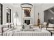 Elegant living room with a fireplace, marble-topped coffee table, and stylish decor at 4560 Harris Trl, Atlanta, GA 30327