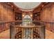 Overhead view of grand living room featuring custom wood trim, built-in bookshelves, and upscale lighting at 4560 Harris Trl, Atlanta, GA 30327