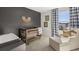 The stylish Bedroom has a crib, changing table, accent chair, and bright window at 4954 Jatoba Rd # 72, Acworth, GA 30101