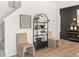 Stylish hallway featuring decorative shelving, seating and modern wall decor at 4954 Jatoba Rd # 72, Acworth, GA 30101