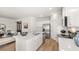 Modern kitchen with stainless steel appliances, white cabinetry, and a center island with bar seating at 4954 Jatoba Rd # 72, Acworth, GA 30101