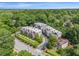 An aerial view of the townhome community surrounded by lush greenery and mature trees in a neighborhood at 710 Oakview Rd, Decatur, GA 30030