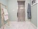 Bathroom features include a glass shower, a light blue robe and marble floors at 710 Oakview Rd, Decatur, GA 30030