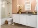 Bathroom features a shower-tub combo with subway tile surround and modern vanity at 710 Oakview Rd, Decatur, GA 30030