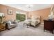Inviting bedroom with neutral colors, a large window, and comfortable seating area at 710 Oakview Rd, Decatur, GA 30030
