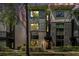 Modern townhome exterior showcasing large windows and a brick facade, in a landscaped community setting at 710 Oakview Rd, Decatur, GA 30030