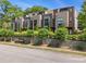 Modern townhomes with brick accents, large windows, and professional landscaping offering curb appeal at 710 Oakview Rd, Decatur, GA 30030