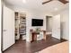 Bedroom with large walk-in closet with ample storage and a mounted TV at 710 Oakview Rd, Decatur, GA 30030