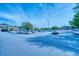 A view of a parking lot filled with cars in front of the stores at 212 Brittany Ct, Duluth, GA 30096