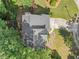Aerial view of the home showcasing the roof, landscaping, and driveway at 2346 Unicoi Ct, Duluth, GA 30097