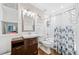 This bathroom has wooden floors, tile and a bathtub at 2346 Unicoi Ct, Duluth, GA 30097