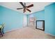 The bedroom has a ceiling fan and light blue walls at 2346 Unicoi Ct, Duluth, GA 30097