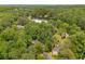 Lush trees and neighborhood streets meet a quiet pond and dam, providing a wooded, serene environment at 2349 Northlake Ne Ct, Atlanta, GA 30345