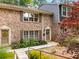 Beautiful brick townhome with a well-manicured front yard and inviting entrance at 2349 Northlake Ne Ct, Atlanta, GA 30345