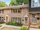 Charming brick townhome with well-manicured landscaping and a welcoming front entrance at 2349 Northlake Ne Ct, Atlanta, GA 30345