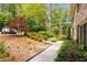 Well-maintained front yard with lush landscaping, stone accents, and a walkway leading to the home at 2349 Northlake Ne Ct, Atlanta, GA 30345