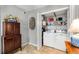 Well-organized laundry room with washer, dryer, and shelving for storage at 2349 Northlake Ne Ct, Atlanta, GA 30345