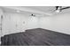 Spacious basement with gray vinyl floors, ceiling fans, and plenty of room at 5490 Chemin De Vie, Sandy Springs, GA 30342