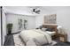 Bright bedroom with a ceiling fan and access to a private balcony at 5490 Chemin De Vie, Sandy Springs, GA 30342