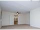 Bright bedroom featuring bathroom access, plush carpet, and ceiling fan at 6026 Belle Meade Ct, Villa Rica, GA 30180