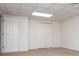Bedroom includes off white carpet, white walls and paneled doors to closet and an adjacent room at 6026 Belle Meade Ct, Villa Rica, GA 30180