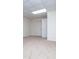 Bright bedroom features neutral carpet, white walls, closet and white paneled door to another room at 6026 Belle Meade Ct, Villa Rica, GA 30180
