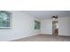 Inviting bedroom with plenty of natural light, carpet floors, and ceiling fan at 6026 Belle Meade Ct, Villa Rica, GA 30180