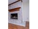 Elegant fireplace featuring marble and wooden mantle at 6026 Belle Meade Ct, Villa Rica, GA 30180