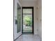 Foyer featuring an open door view of the porch with marble flooring at 6026 Belle Meade Ct, Villa Rica, GA 30180