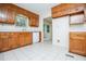 Cozy kitchen featuring wood cabinets and ample counter space at 6026 Belle Meade Ct, Villa Rica, GA 30180