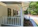 Cozy covered porch with railing, offering a charming outdoor space at 6026 Belle Meade Ct, Villa Rica, GA 30180