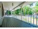 Inviting covered porch, perfect for relaxing and enjoying the outdoors at 6026 Belle Meade Ct, Villa Rica, GA 30180
