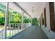 Inviting covered porch, perfect for relaxing and enjoying the outdoors at 6026 Belle Meade Ct, Villa Rica, GA 30180