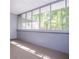 Screened porch provides sunlight with open views to the backyard and woods at 6026 Belle Meade Ct, Villa Rica, GA 30180