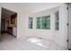 Sunroom with large windows and tile floor at 6026 Belle Meade Ct, Villa Rica, GA 30180