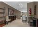 Hallway with closet, leading to dining area and mirrored wall for an open feel at 1421 Peachtree Ne St # 212, Atlanta, GA 30309