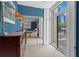 Hallway leading to bedroom with storage, artwork, and access to a balcony at 1421 Peachtree Ne St # 212, Atlanta, GA 30309